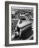 View of Newly Built Houses Jammed Side by Side, Divided by a Street Clogged with Moving Vans-J. R. Eyerman-Framed Photographic Print