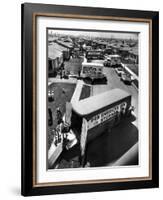 View of Newly Built Houses Jammed Side by Side, Divided by a Street Clogged with Moving Vans-J. R. Eyerman-Framed Photographic Print