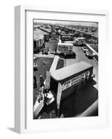 View of Newly Built Houses Jammed Side by Side, Divided by a Street Clogged with Moving Vans-J. R. Eyerman-Framed Photographic Print