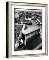 View of Newly Built Houses Jammed Side by Side, Divided by a Street Clogged with Moving Vans-J. R. Eyerman-Framed Photographic Print