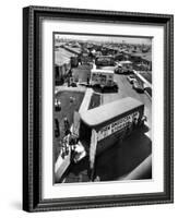 View of Newly Built Houses Jammed Side by Side, Divided by a Street Clogged with Moving Vans-J. R. Eyerman-Framed Photographic Print
