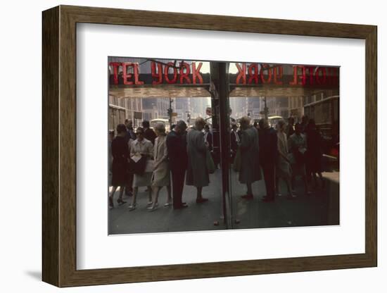 View of Pedestrians Reflected in the Glass of the Hotel York on 7th Ave, New York, New York, 1960-Walter Sanders-Framed Photographic Print