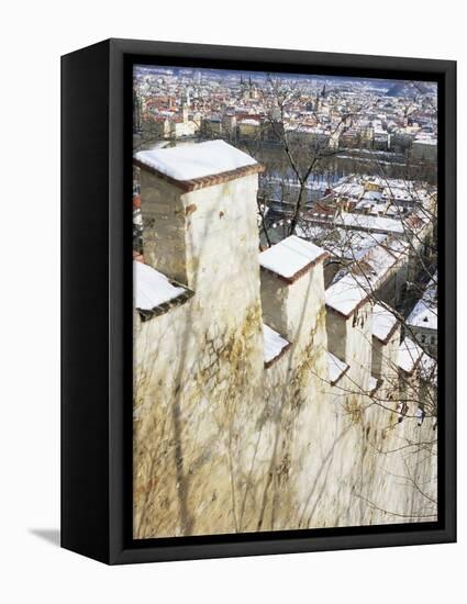 View of Prague from Snow-Covered Gothic Hunger Wall on Petrin Hill, Prague, Czech Republic-Richard Nebesky-Framed Premier Image Canvas