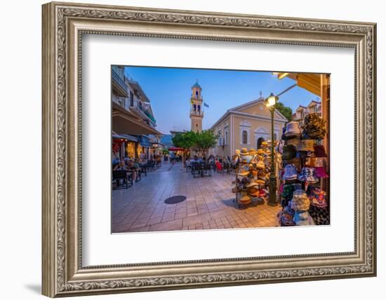 View of restaurant and Church of Agios Spiridon in Argostoli at dusk, Argostolion, Kefalonia-Frank Fell-Framed Photographic Print