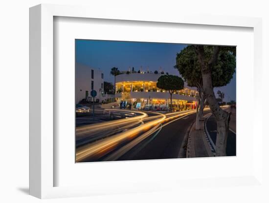 View of shops and bars at dusk, Puerto del Carmen, Lanzarote, Las Palmas-Frank Fell-Framed Photographic Print