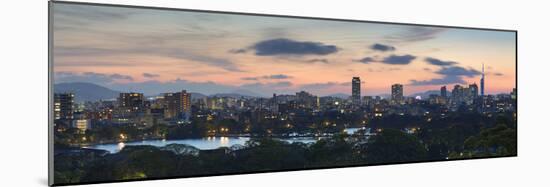 View of Skyline of Coastal Area of Fukuoka at Sunset, Kyushu, Japan-Ian Trower-Mounted Photographic Print