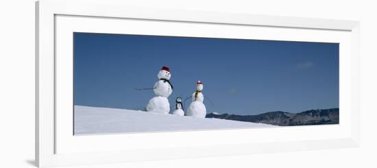 View of Snowmen in Snow Covered Landscape, Waterbury, Vermont, USA-null-Framed Photographic Print