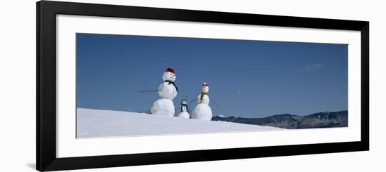 View of Snowmen in Snow Covered Landscape, Waterbury, Vermont, USA-null-Framed Photographic Print