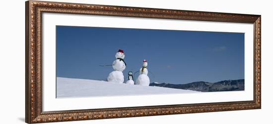 View of Snowmen in Snow Covered Landscape, Waterbury, Vermont, USA-null-Framed Photographic Print
