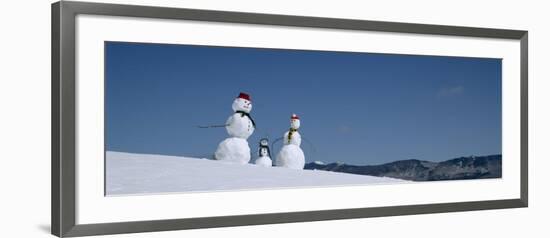 View of Snowmen in Snow Covered Landscape, Waterbury, Vermont, USA-null-Framed Photographic Print