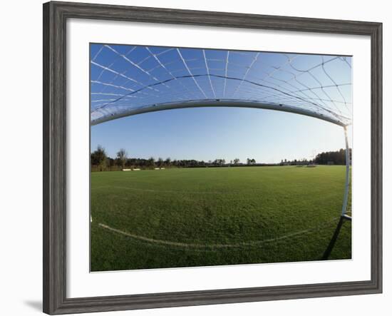 View of Soccer Field Through Goal-Steven Sutton-Framed Photographic Print