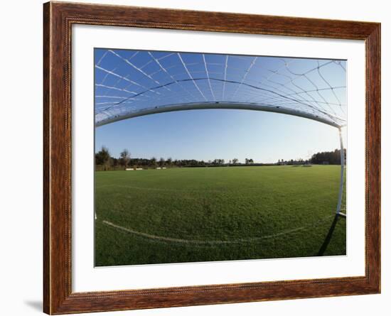 View of Soccer Field Through Goal-Steven Sutton-Framed Photographic Print