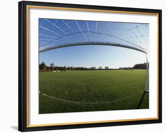 View of Soccer Field Through Goal-Steven Sutton-Framed Photographic Print