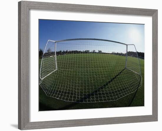 View of Soccer Field Through Goal-Steven Sutton-Framed Photographic Print