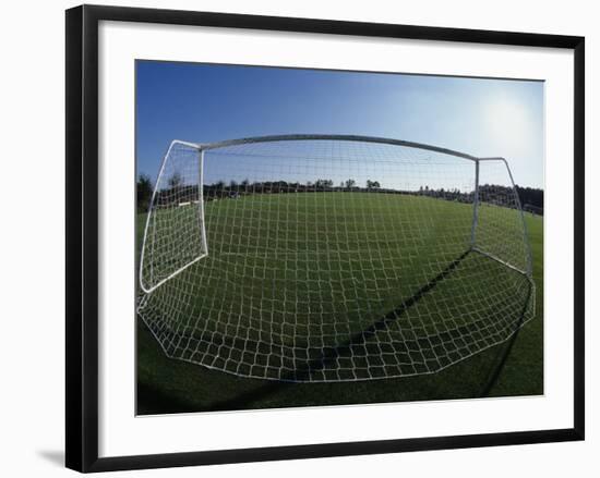 View of Soccer Field Through Goal-Steven Sutton-Framed Photographic Print