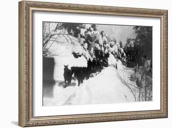 View of Stagecoach Driving through Snowy Mitchell Rd - Downieville, CA-Lantern Press-Framed Art Print