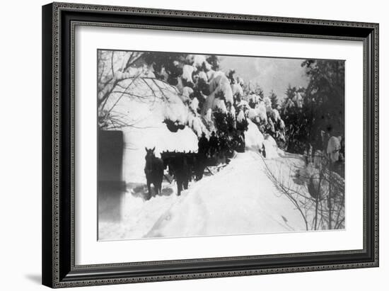 View of Stagecoach Driving through Snowy Mitchell Rd - Downieville, CA-Lantern Press-Framed Art Print