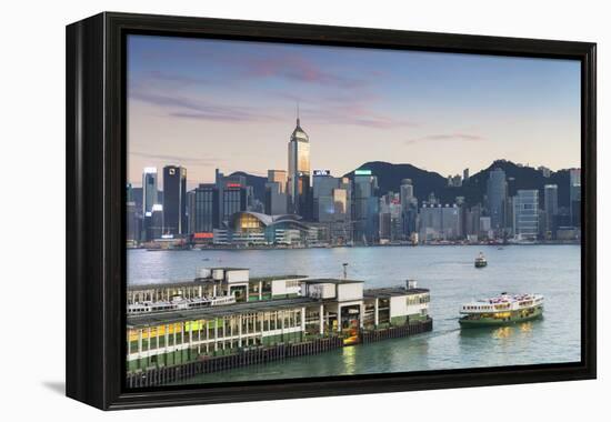 View of Star Ferry Terminal and Hong Kong Island Skyline at Dusk, Hong Kong, China, Asia-Ian Trower-Framed Premier Image Canvas