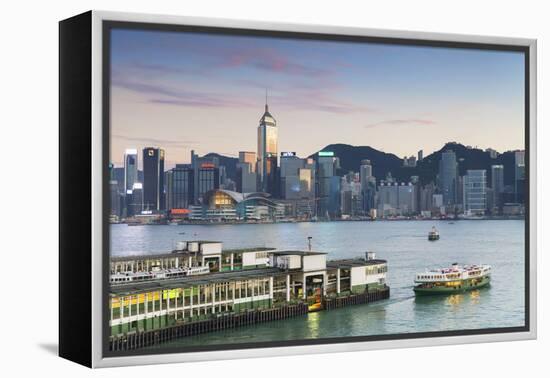 View of Star Ferry Terminal and Hong Kong Island Skyline at Dusk, Hong Kong, China, Asia-Ian Trower-Framed Premier Image Canvas