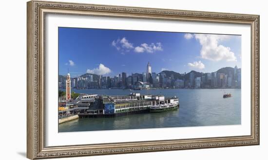 View of Star Ferry Terminal and Hong Kong Island skyline, Hong Kong, China-Ian Trower-Framed Photographic Print