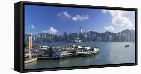 View of Star Ferry Terminal and Hong Kong Island skyline, Hong Kong, China-Ian Trower-Framed Premier Image Canvas