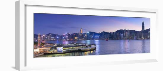 View of Star Ferry Terminal and Hong Kong Island skyline, Hong Kong, China-Ian Trower-Framed Photographic Print