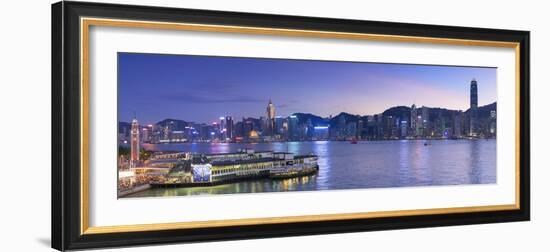 View of Star Ferry Terminal and Hong Kong Island skyline, Hong Kong, China-Ian Trower-Framed Photographic Print