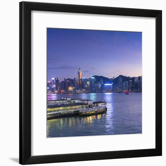 View of Star Ferry Terminal and Hong Kong Island skyline, Hong Kong, China-Ian Trower-Framed Photographic Print