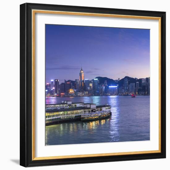 View of Star Ferry Terminal and Hong Kong Island skyline, Hong Kong, China-Ian Trower-Framed Photographic Print