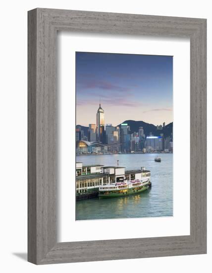 View of Star Ferry Terminal and Hong Kong Island skyline, Hong Kong, China-Ian Trower-Framed Photographic Print