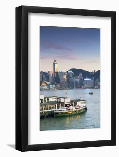 View of Star Ferry Terminal and Hong Kong Island skyline, Hong Kong, China-Ian Trower-Framed Photographic Print