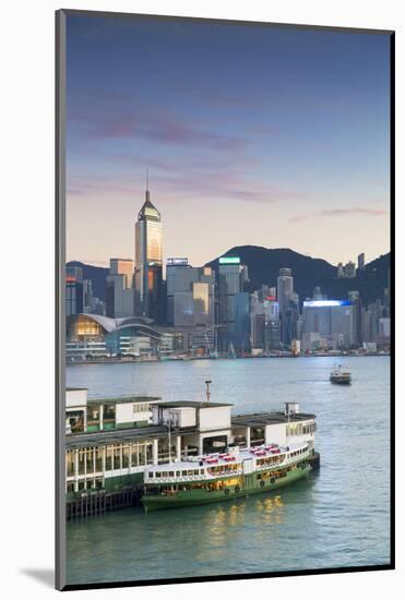 View of Star Ferry Terminal and Hong Kong Island skyline, Hong Kong, China-Ian Trower-Mounted Photographic Print