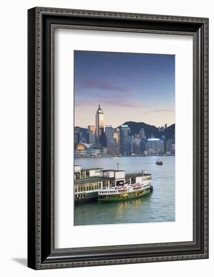 View of Star Ferry Terminal and Hong Kong Island skyline, Hong Kong, China-Ian Trower-Framed Photographic Print