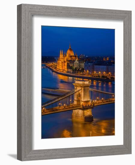 View of the Chain bridge over the River Danube, UNESCO World Heritage Site, with the Parliament in-David Rocaberti-Framed Photographic Print