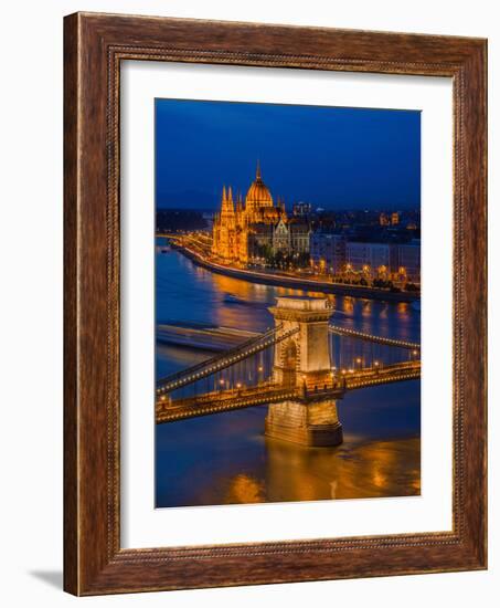 View of the Chain bridge over the River Danube, UNESCO World Heritage Site, with the Parliament in-David Rocaberti-Framed Photographic Print