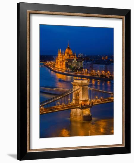 View of the Chain bridge over the River Danube, UNESCO World Heritage Site, with the Parliament in-David Rocaberti-Framed Photographic Print