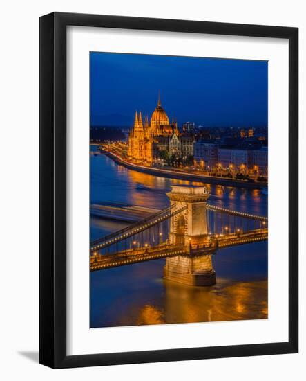 View of the Chain bridge over the River Danube, UNESCO World Heritage Site, with the Parliament in-David Rocaberti-Framed Photographic Print