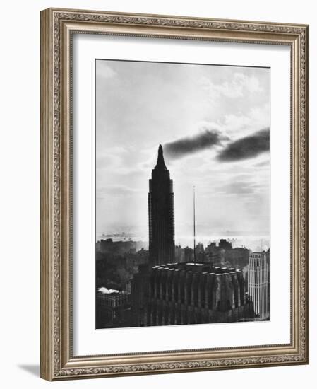 View of the Empire State Building Still under Construction in New York City-Margaret Bourke-White-Framed Photographic Print