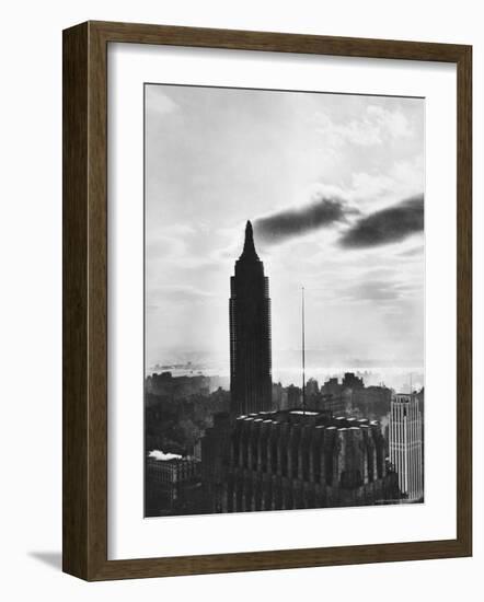 View of the Empire State Building Still under Construction in New York City-Margaret Bourke-White-Framed Photographic Print