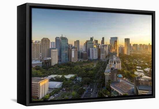 View of the Makati District in Manila at Sunrise, Philippines, Southeast Asia, Asia-Andrew Sproule-Framed Premier Image Canvas