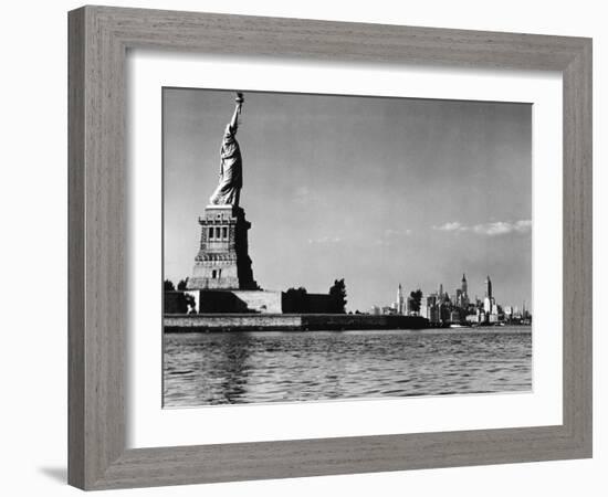 View of the Statue of Liberty and the Sklyline of the City-Margaret Bourke-White-Framed Photographic Print