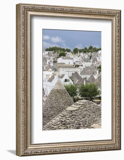 View of the typical Trulli built with dry stone with a conical roof, Alberobello, UNESCO World Heri-Roberto Moiola-Framed Photographic Print