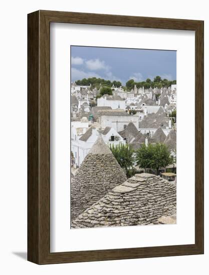 View of the typical Trulli built with dry stone with a conical roof, Alberobello, UNESCO World Heri-Roberto Moiola-Framed Photographic Print