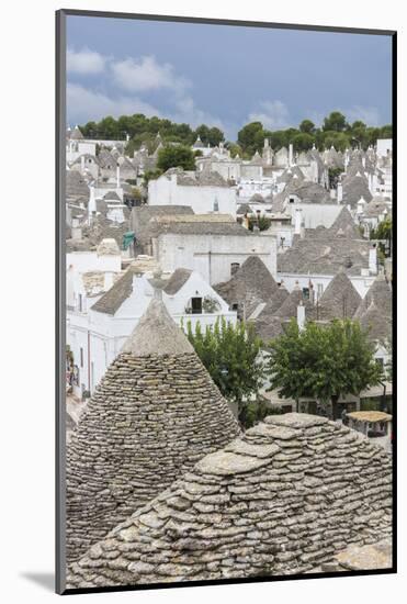 View of the typical Trulli built with dry stone with a conical roof, Alberobello, UNESCO World Heri-Roberto Moiola-Mounted Photographic Print