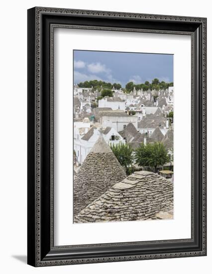 View of the typical Trulli built with dry stone with a conical roof, Alberobello, UNESCO World Heri-Roberto Moiola-Framed Photographic Print