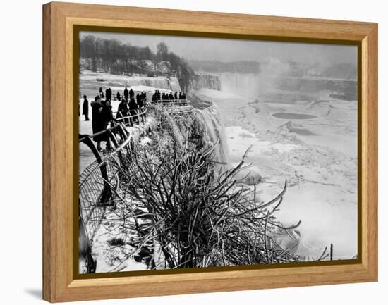 View of Visitors Watching Ice Formations at the American Side of a Frozen Niagara Falls-Margaret Bourke-White-Framed Premier Image Canvas