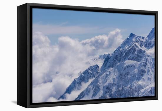 View on Winter Snowy Mountains and Blue Sky above Clouds, Krasnaya Polyana, Sochi, Russia-wasja-Framed Premier Image Canvas