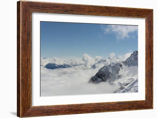 View on Winter Snowy Mountains and Blue Sky above Clouds, Krasnaya Polyana, Sochi, Russia-wasja-Framed Photographic Print