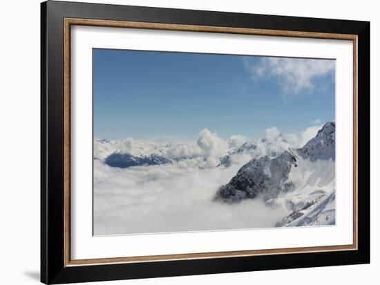 View on Winter Snowy Mountains and Blue Sky above Clouds, Krasnaya Polyana, Sochi, Russia-wasja-Framed Photographic Print