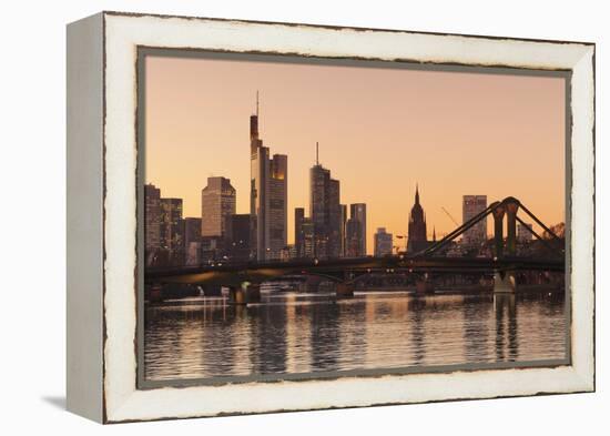 View over Main River to Floesserbruecke bridge and financial district, Frankfurt, Hesse, Germany, E-Markus Lange-Framed Premier Image Canvas